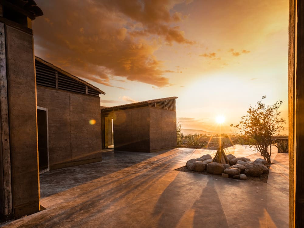 Courtyard with sunset painting the skies orange and yellow