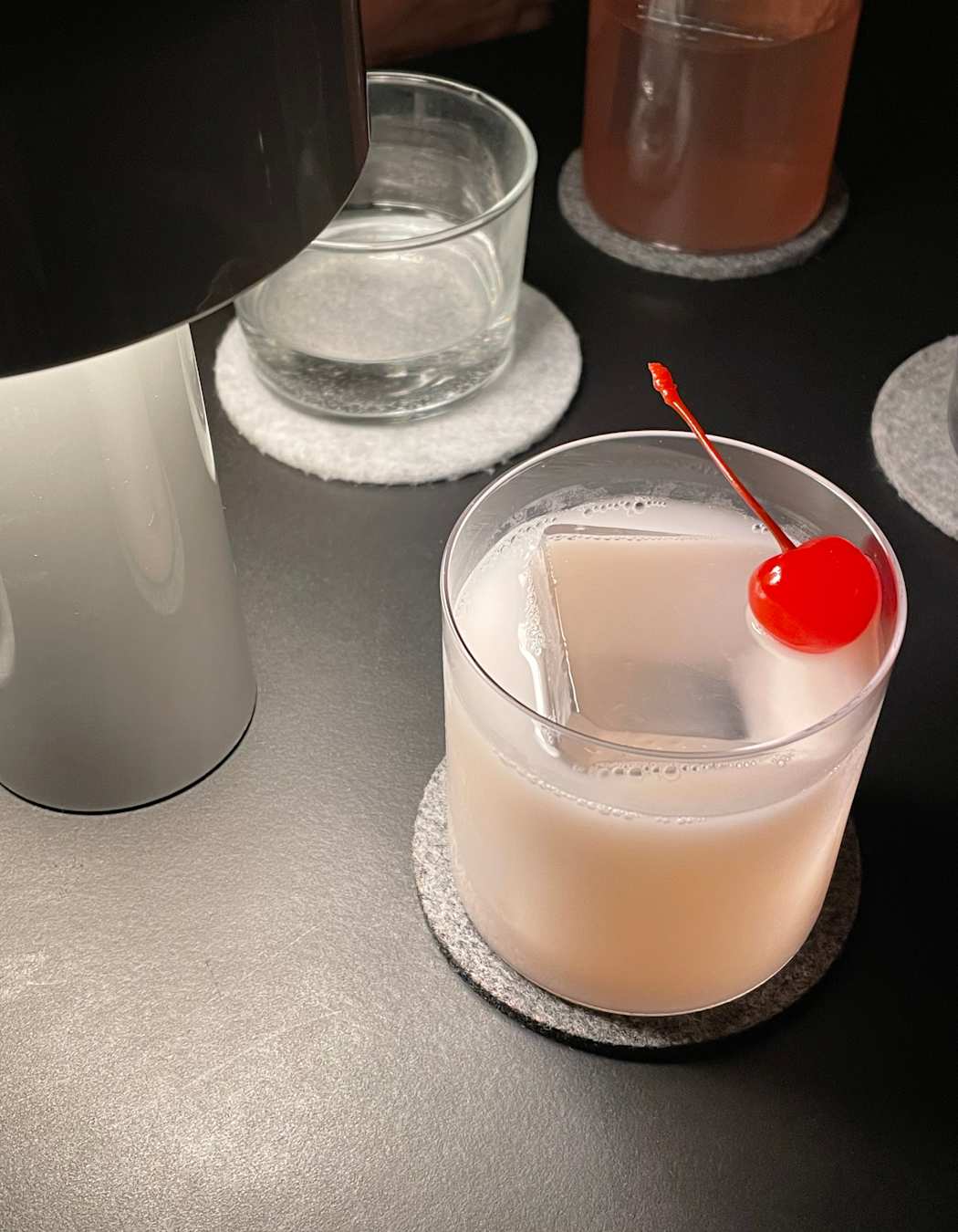 Cocktail under a table lamp